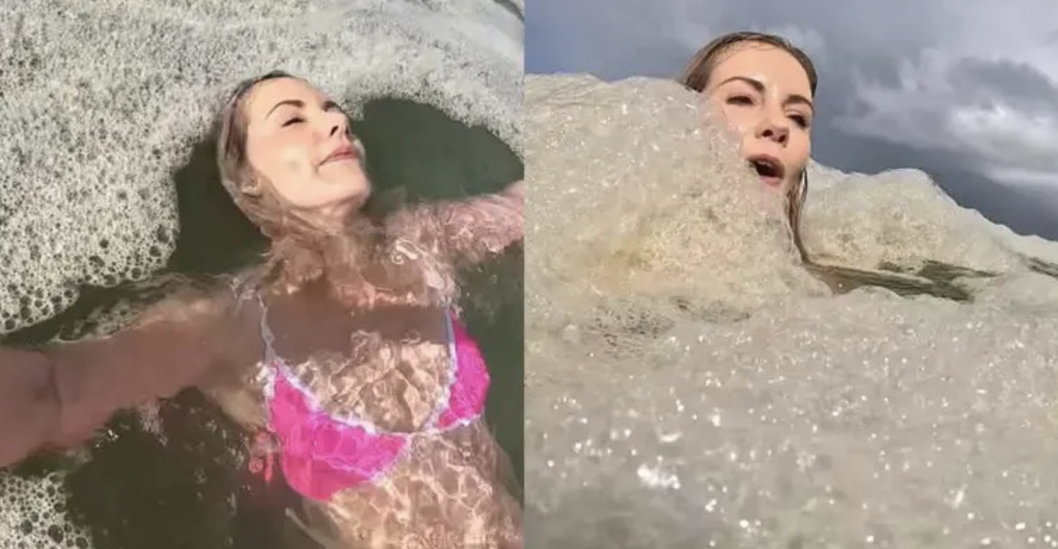 Influencer nada feliz entre ‘espuma marina’ sin saber que eran aguas residuales