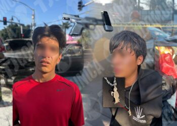 Ni la Santa Muerte los salvó; municipales de Tijuana atoran a menor y acompañante por disparar contra un hombre en taller mecánico